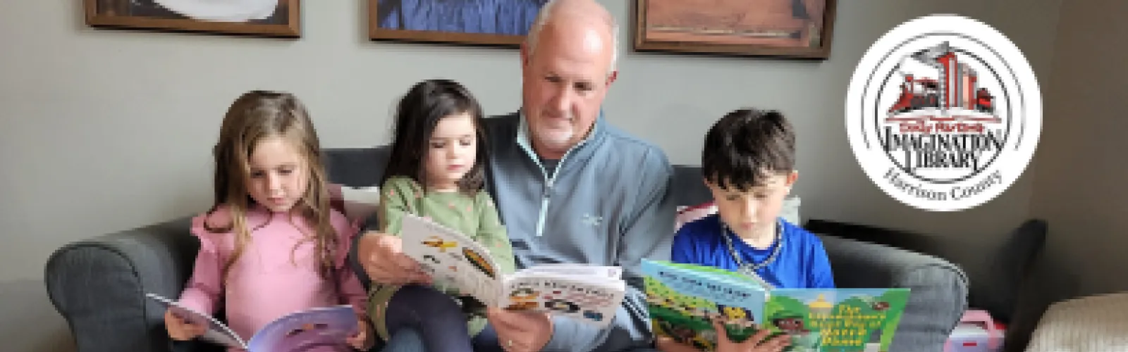 Man reading to children; click for more information about Dolly Parton's Imagination Library